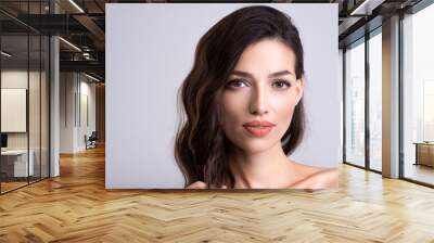 Woman with beauty brown hair. Portrait of brunette woman with beautiful  hairstyle. Fashion model, at studio. Beautiful young woman with long brown hair.  Clean fresh clean skin face. Wall mural