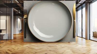 white porcelain dinner dishes and fork on a gray background, in the style of dark gold and dark beige, generative AI Wall mural