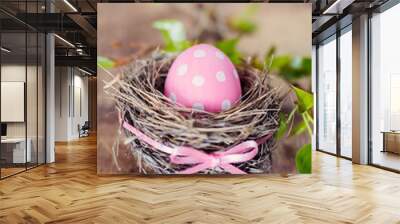 Pink easter egg in nest Wall mural