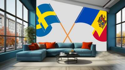 Crossed and waving flags of Sweden and Moldova Wall mural