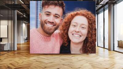 Happy red ginger hair brother and sister having fun doing selfie outdoor - Focus on faces Wall mural