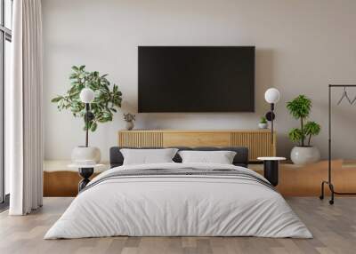 White wall mounted tv on cabinet in living room with leather sofa and minimal design Wall mural