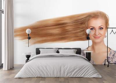 Woman with long blowing hair Wall mural