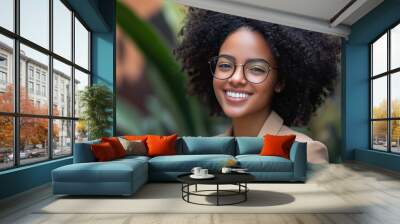 Photo of Young happy busy business woman Wall mural