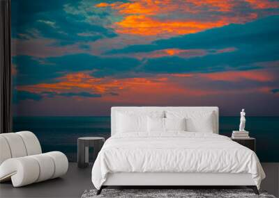 Beautiful sky with clouds over the ocean at sunrise  Wall mural