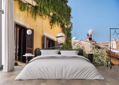 Architecture of Rome, Italy. Old buildings and streets on sunny summer day Wall mural