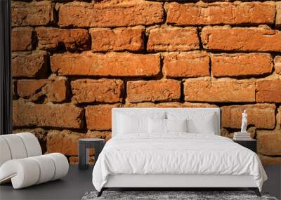 Old weathered grunge brick masonry wall closup as brick background Wall mural