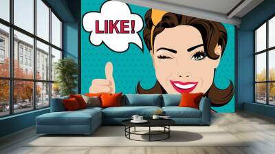 pop art winking woman with thumbs up gesture Wall mural