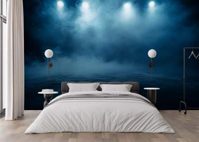 Mysterious blue fog over dark surface with bright light above, creating a moody and atmospheric scene. Wall mural