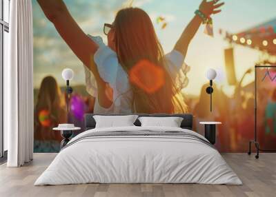 Attractive young beautiful woman dancing at a music festival party. Wall mural