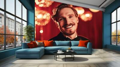 A smiling man in a tuxedo at a festive event, adorned with sparkling lights and a joyful atmosphere that captures celebration. Wall mural