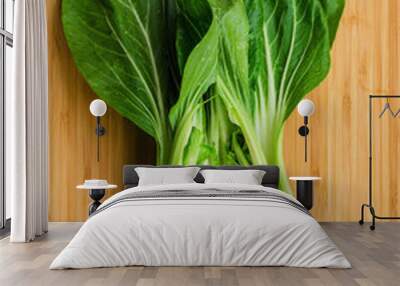 Bok choy with  knife on wooden background. Pak choy is a type of Chinese cabbage(Qing geng cai )and one of the healthiest vegetable and popular superfood. Wall mural