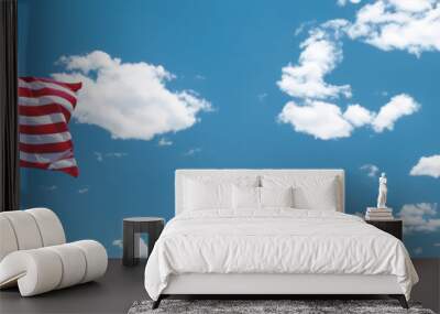 National flag day banner with United States of America flag on blue sky with clouds, copy space Wall mural