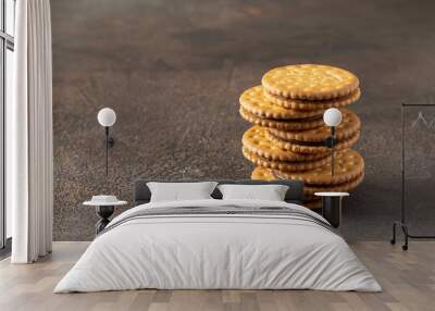 Sandwich biscuits cookies suck  on dark background. Crackers with cream Wall mural