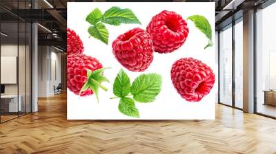 Flying ripe juicy raspberries with leaves isolated on a white background. Wall mural