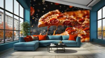 A flying slice of pepperoni pizza with stretching cheese on a black background. Wall mural