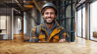 Cute Caucasian bearded construction worker with safety helmet on head Wall mural