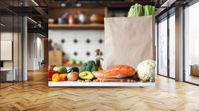 Fresh vegetables, fruits, nuts and salmon steak. Wall mural