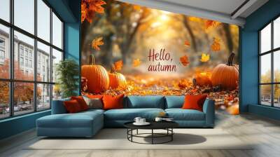 Hello Autumn white chalk lettering on blackboard. Autumn seasonal flat lay photo on wooden background. Hello Autumn inscription with orange leaf frame. Fall season banner template. Yellow leaf texture Wall mural