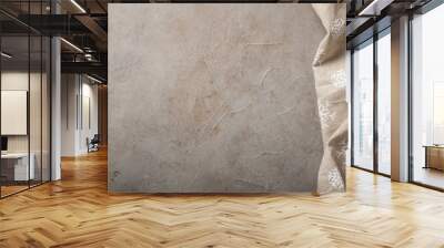 Kitchen stone table with towel. Top view with copy space. Concrete beige background with a touch of rust Wall mural