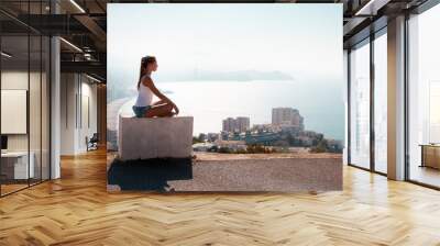 Summer vacation travel Spain photo - girl on the top of the mountain near Benidorm watching on the beach Wall mural