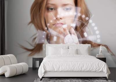 Future technology. Woman working with futuristic interface  Wall mural