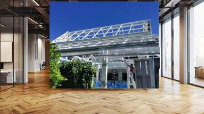 iron roof structure painted white and blue sky as background. Copy space. Wall mural