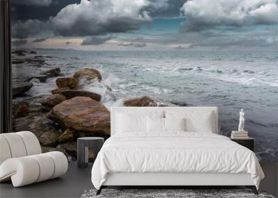 Sea shore with blurred water Wall mural