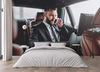 Businessman in car Wall mural