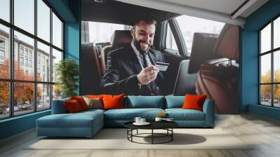 Businessman in car Wall mural