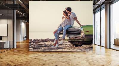 Couple with retro car Wall mural