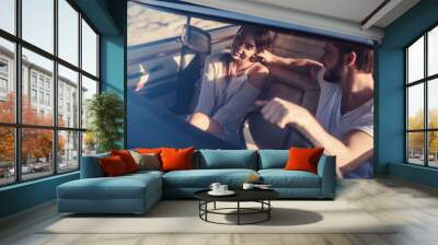 Couple with retro car Wall mural