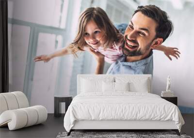 Dad with daughter at home Wall mural