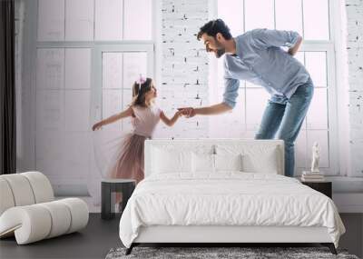 Dad with daughter at home Wall mural