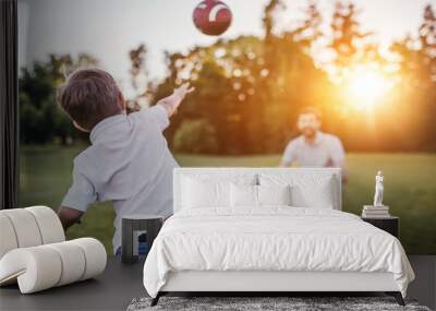 Dad with son playing American football Wall mural