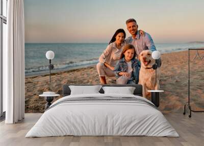 Family with dog on the beach Wall mural