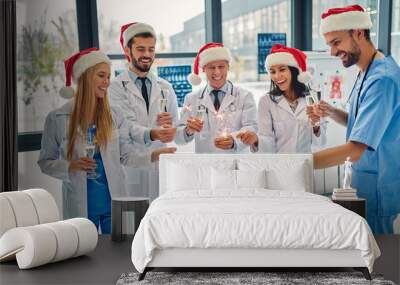 Group of doctors celebrating Christmas Wall mural