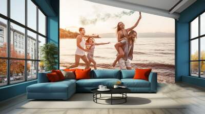 Group of friends on beach Wall mural