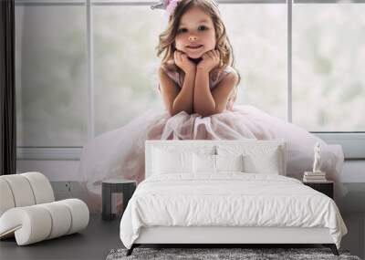 Little cute girl in dress Wall mural