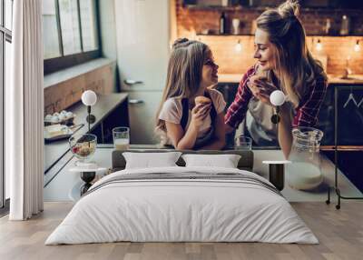 Mom with daughter on kitchen Wall mural