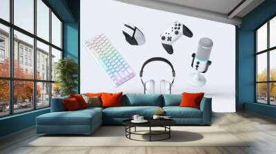 Flying gamer gears like mouse, keyboard, joystick, headset, VR, microphone Wall mural