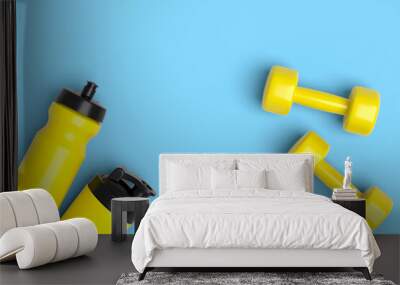 Isometric view of sport equipment like water bottle and dumbbell on blue Wall mural