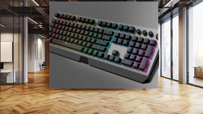 Realistic computer keyboard with metallic chrome texture isolated on black Wall mural