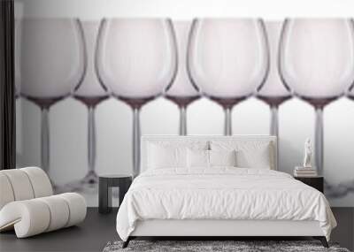 Set of red and white glasses with wine isolated on white background Wall mural