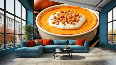 Sweet potato casserole with a crunchy pecan topping in white ceramic dish. Concept of Thanksgiving Day side dishes Wall mural