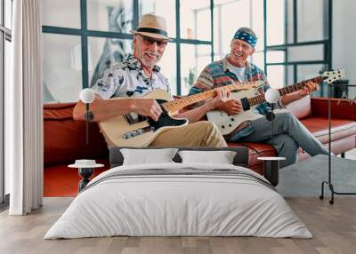 Senior friends playing guitars Wall mural