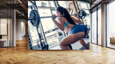 Sports woman in gym Wall mural