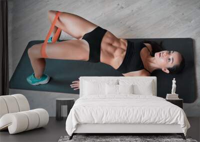 Sporty woman at home Wall mural