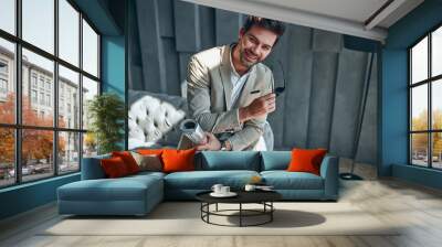 Stylish man at home Wall mural