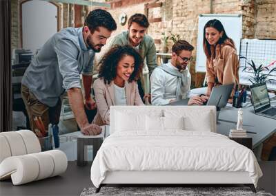 Young business people in office Wall mural